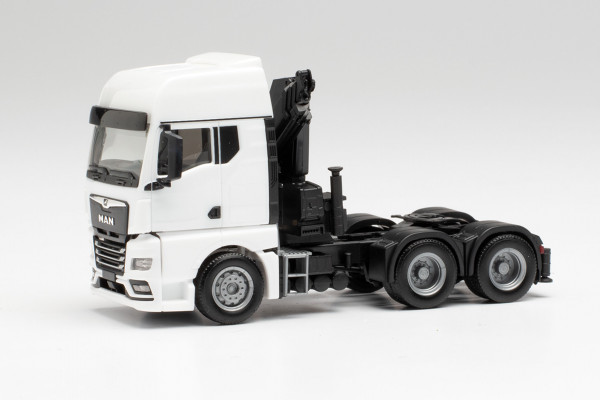 Herpa 313100 - MAN TGX GX 6x4 Zugmaschine mit Ladekran und ausfahrbaren Stützen, weiß - 1:87